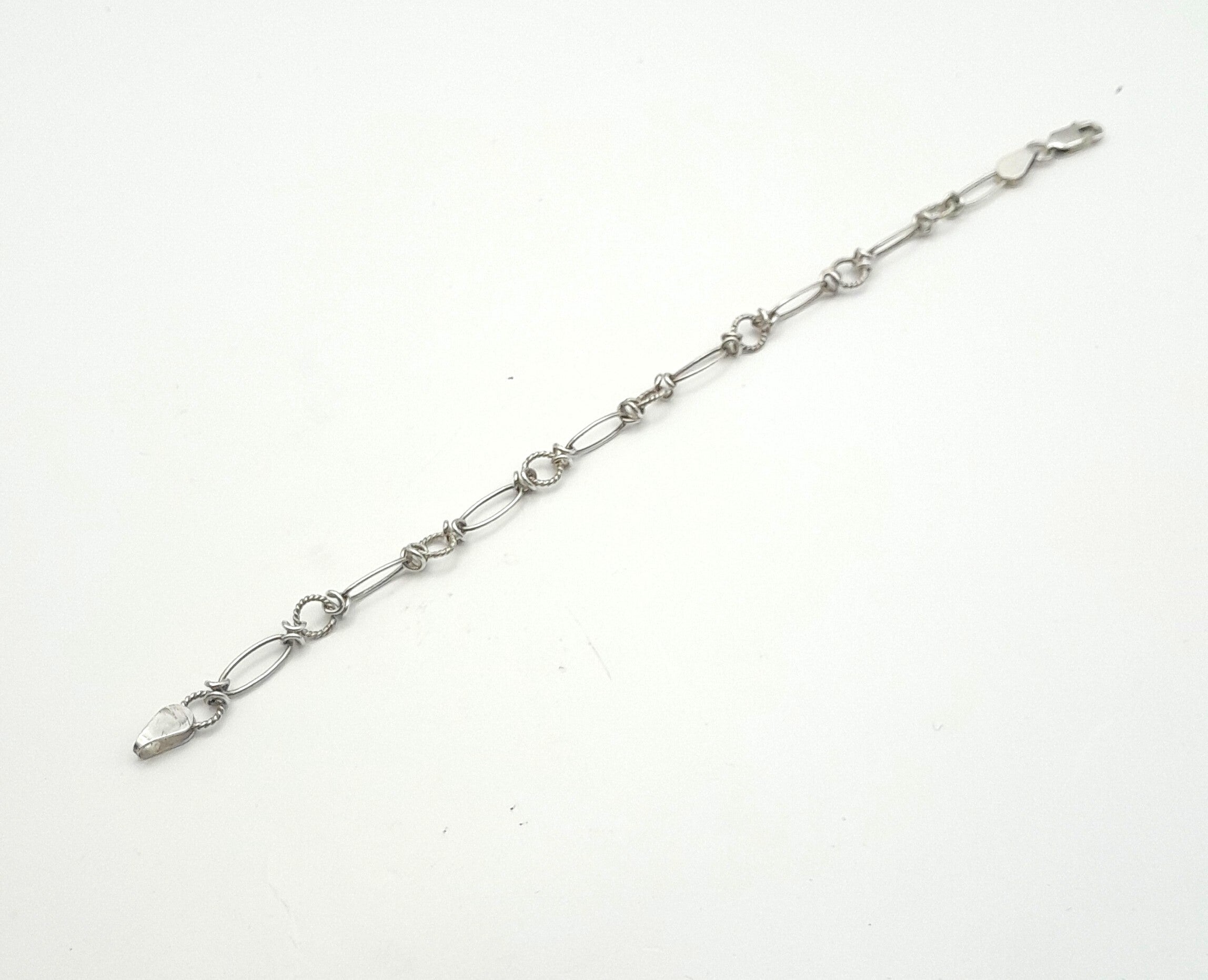 Sterling Silver Chain Bracelet – Twisted Loop Link Design