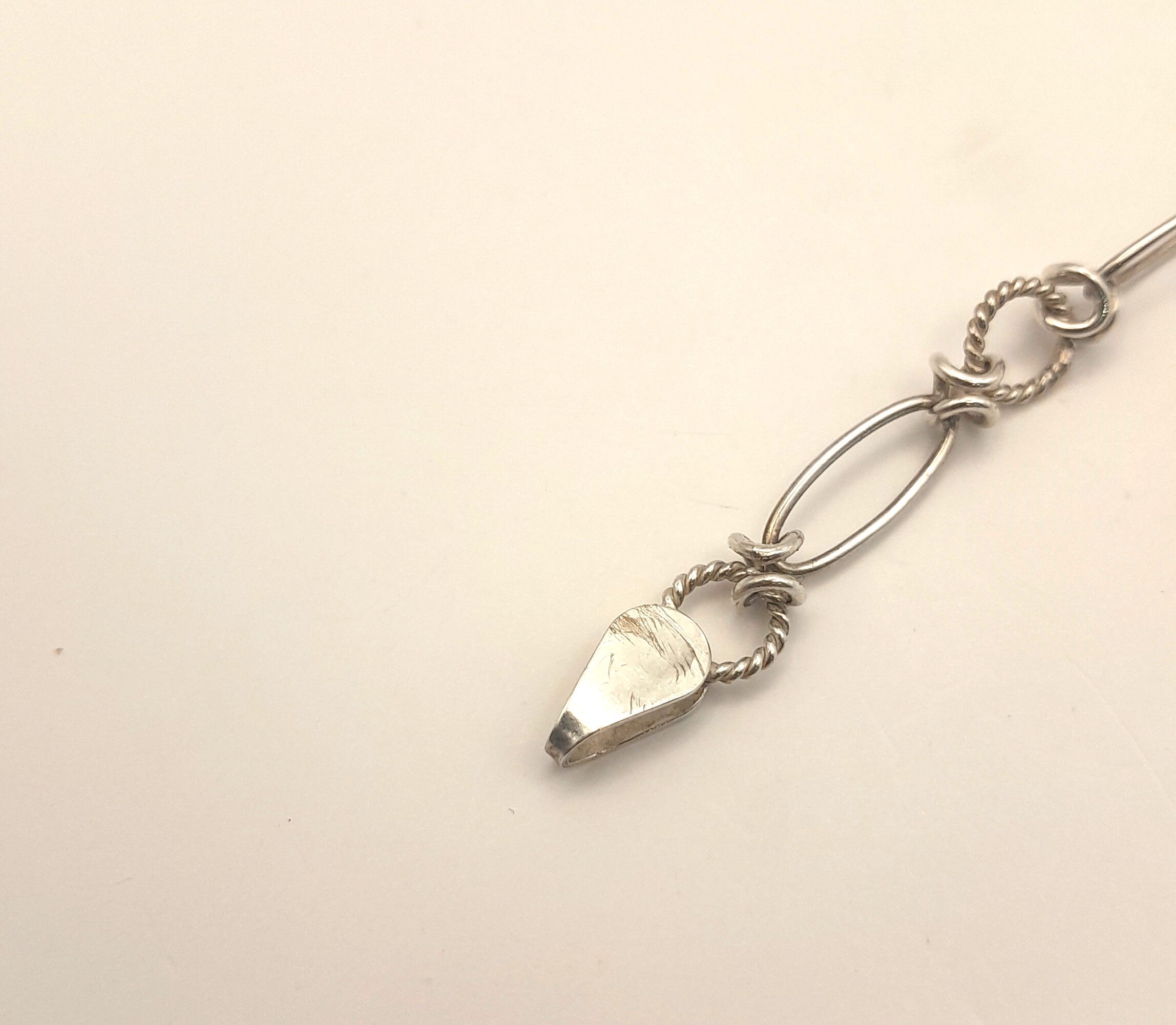 Sterling Silver Chain Bracelet – Twisted Loop Link Design