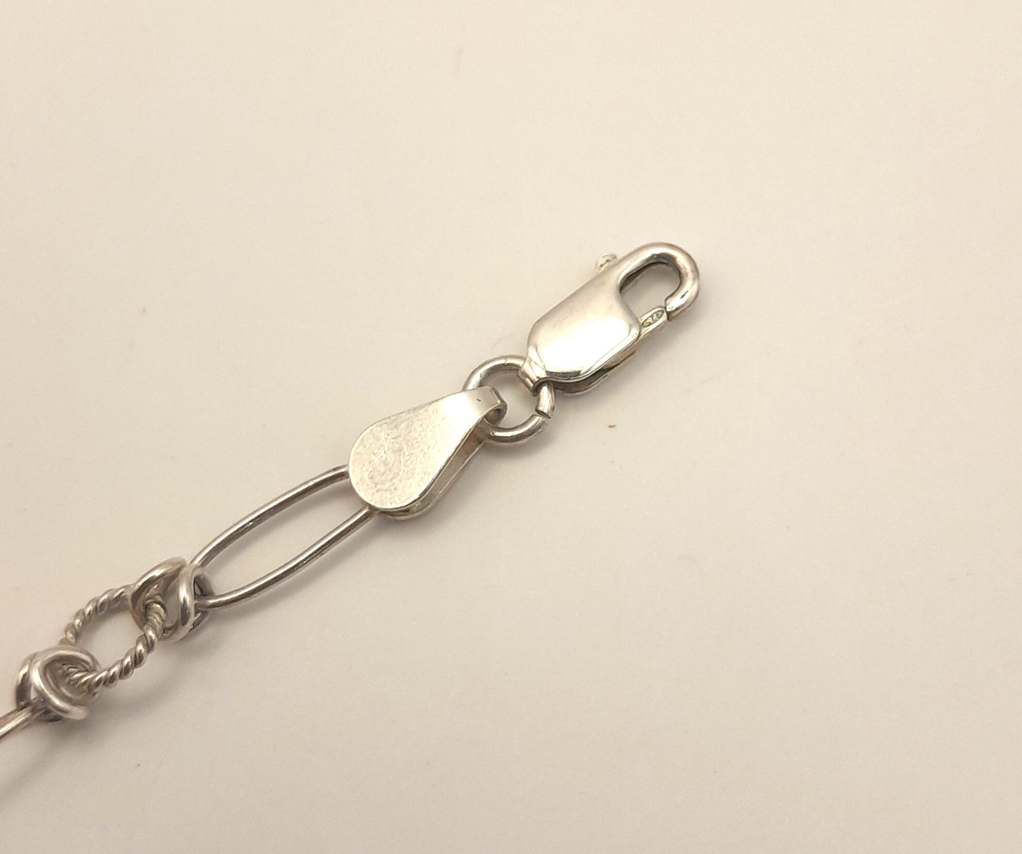Sterling Silver Chain Bracelet – Twisted Loop Link Design